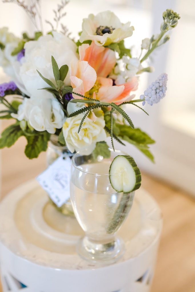 Cucumber infused water and flower arrangement